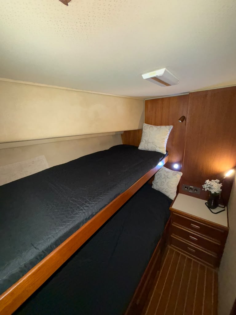 The second cabin, with a single berth and reading light